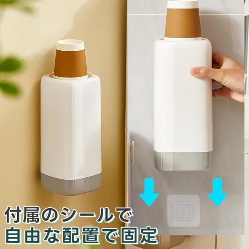 付属の固定用シールでホルダーを設置する様子